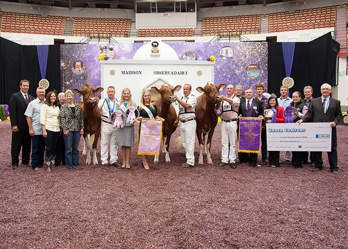 KHW Regiment Apple-Red stands with her clone, Apple-3, and daughter, Candy Apple for the Champion photo in 2013